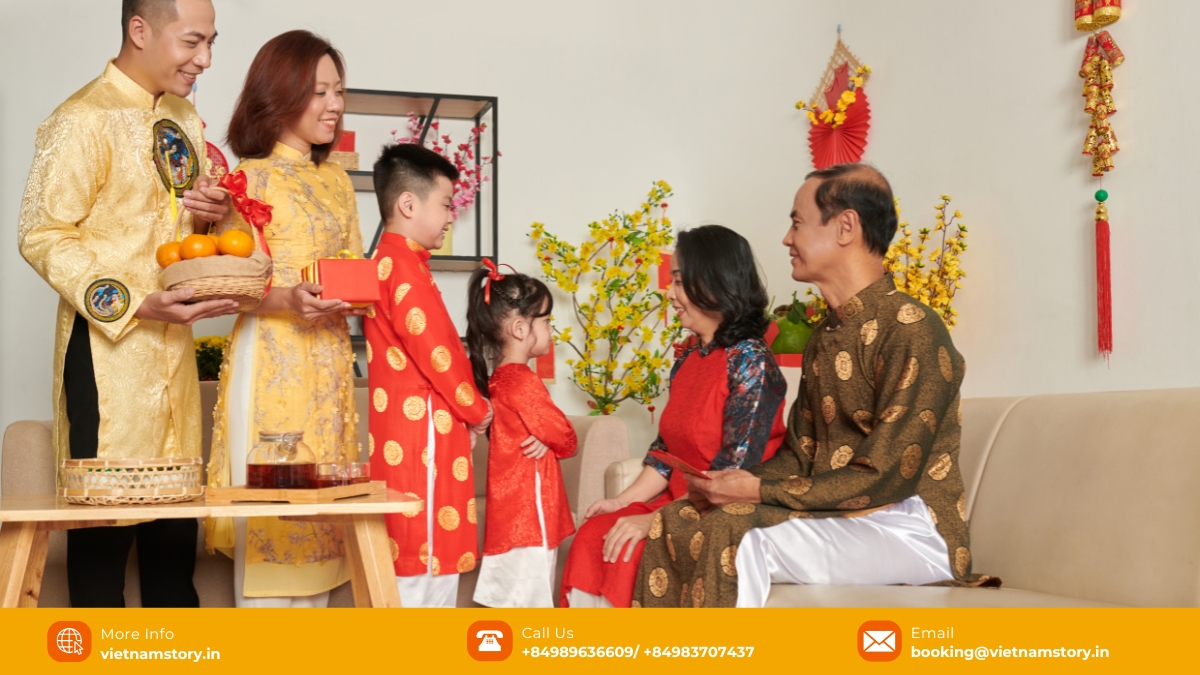 Younger family members pay their respects to elders, receiving lì xì—red envelopes containing money—as a symbol of good fortune and blessings for the new year.