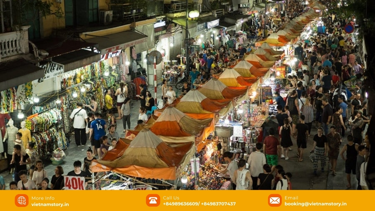 People looking for their favourite items at some stalls in Hanoi night market