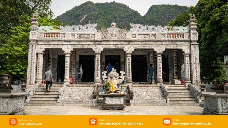 Stone pillars and traditional architecture at Thai Vi Temple