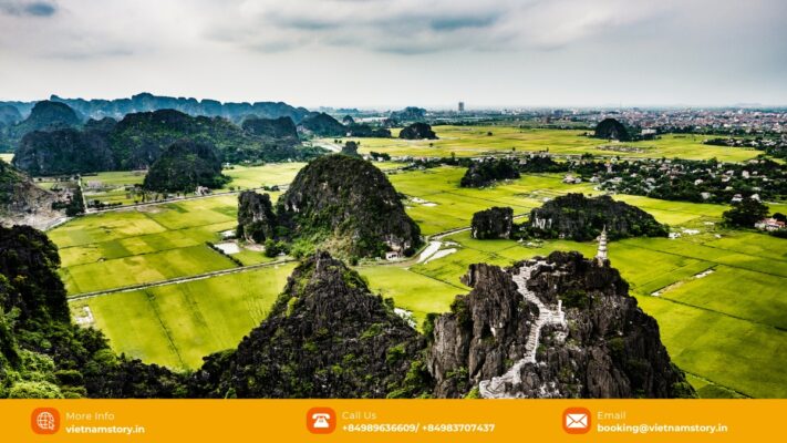 Rice fields and limestone landscape near Van Long in Ninh Binh
