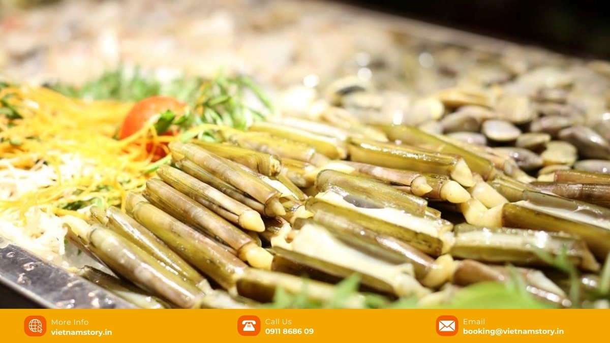 Ha Long Bay Food: A Gastronomic Odyssey For Indian Travelers 7 Razor clams areA famous specialty in Ha Long (Quang Ninh), known for its sweet, fragrant, and chewy texture, it is often stir-fried with butter and garlic, stir-fried with water spinach, stir-fried with chili sauce, or grilled.