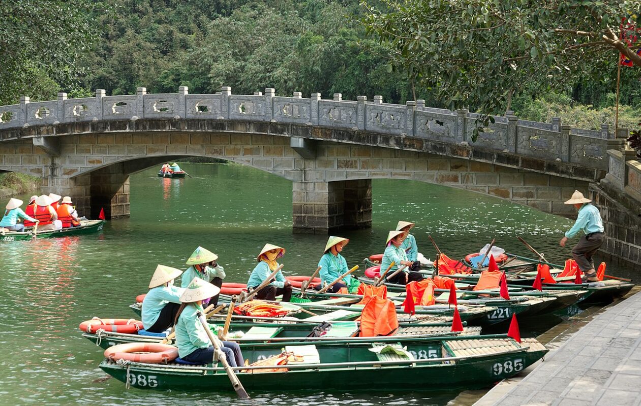 Tour boats at Trang An in Ninh Binh, representing the North Vietnam route we recommend for a focused five-day itinerary